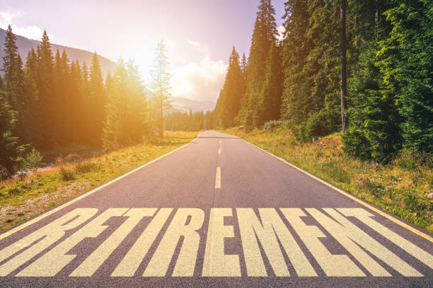 Retirement word written on road in the mountains